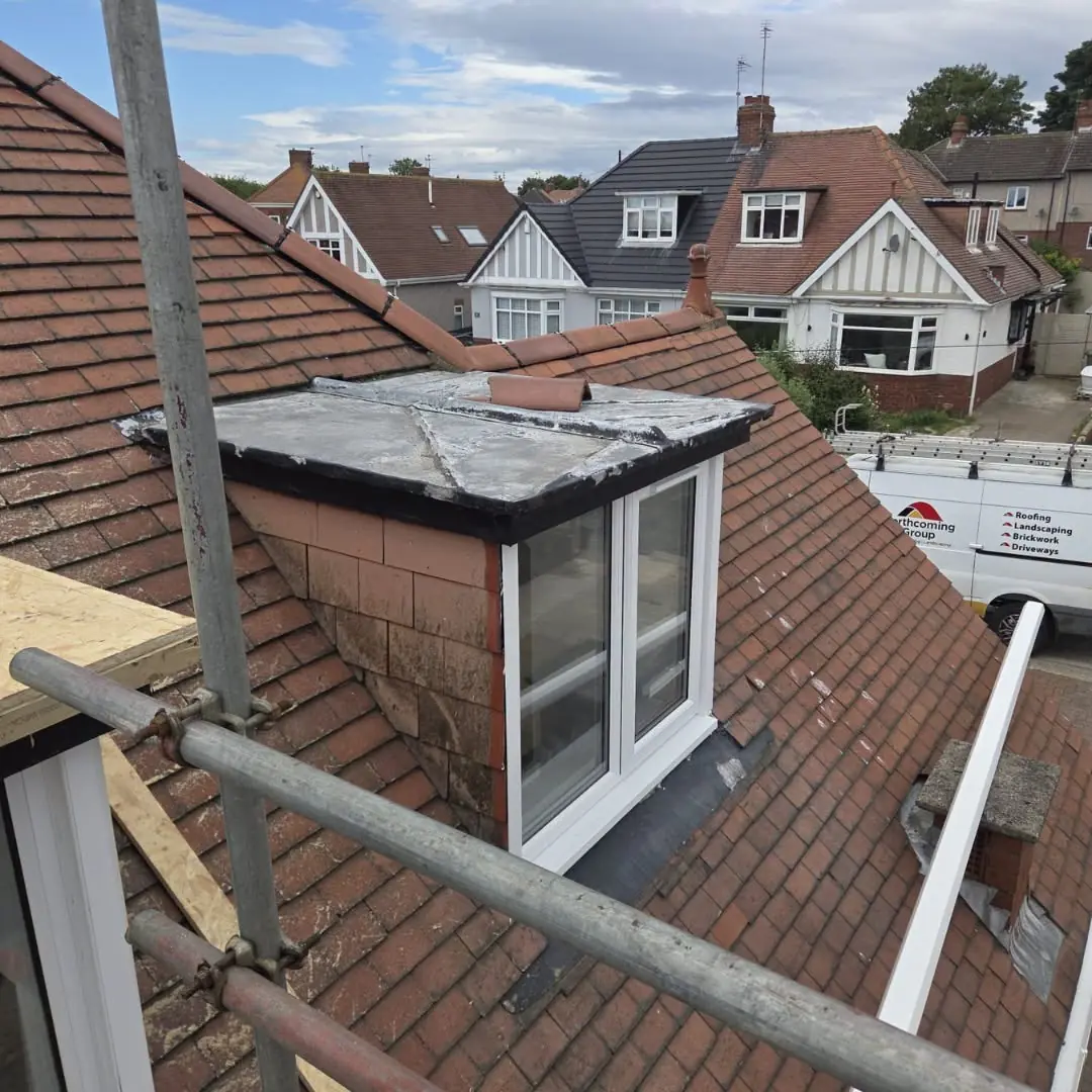 Step 2: inspecting an old felt flat roof before replacement