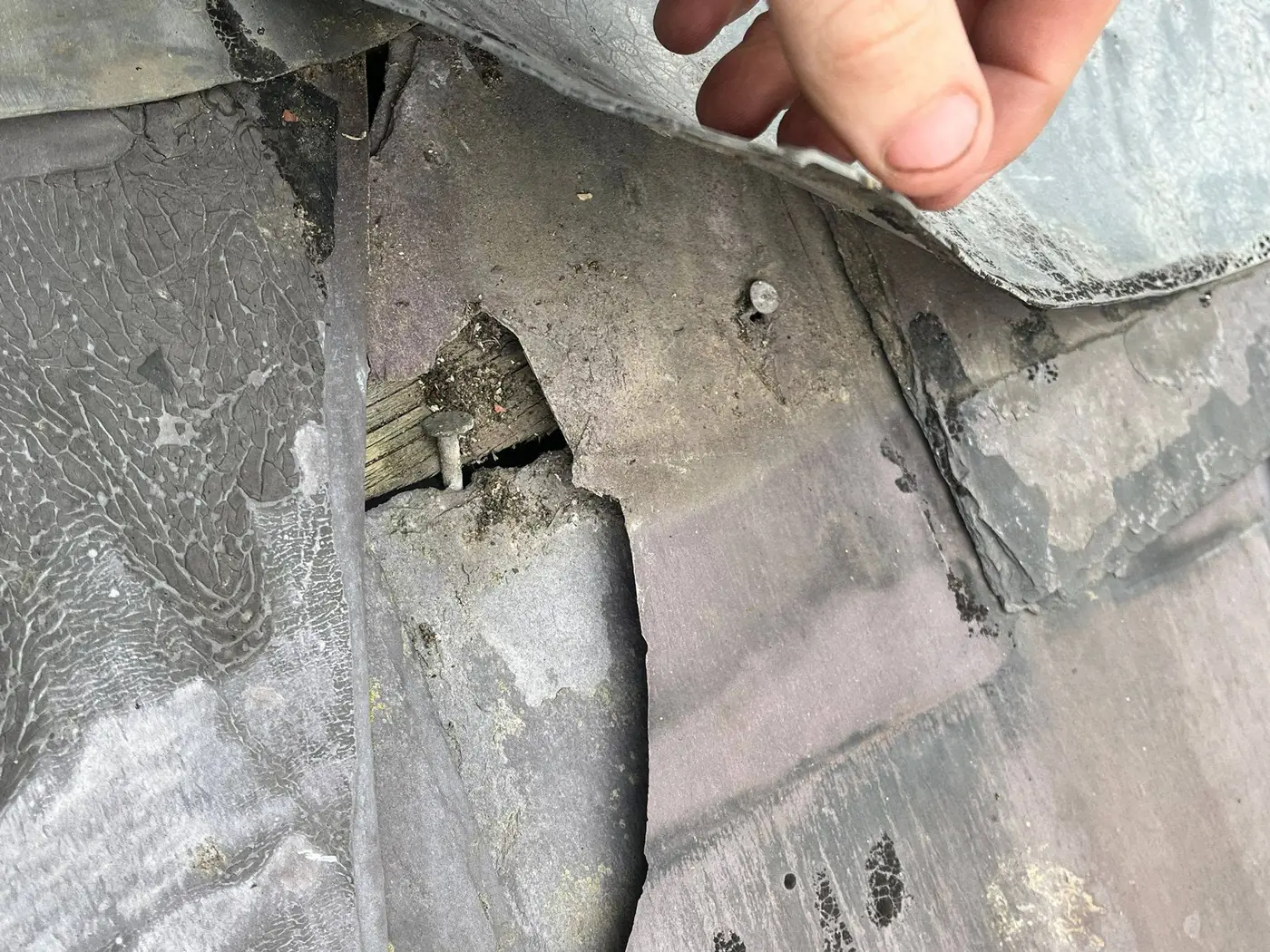 Roof repairs in Sunderland: lifted flashing found during an inspection