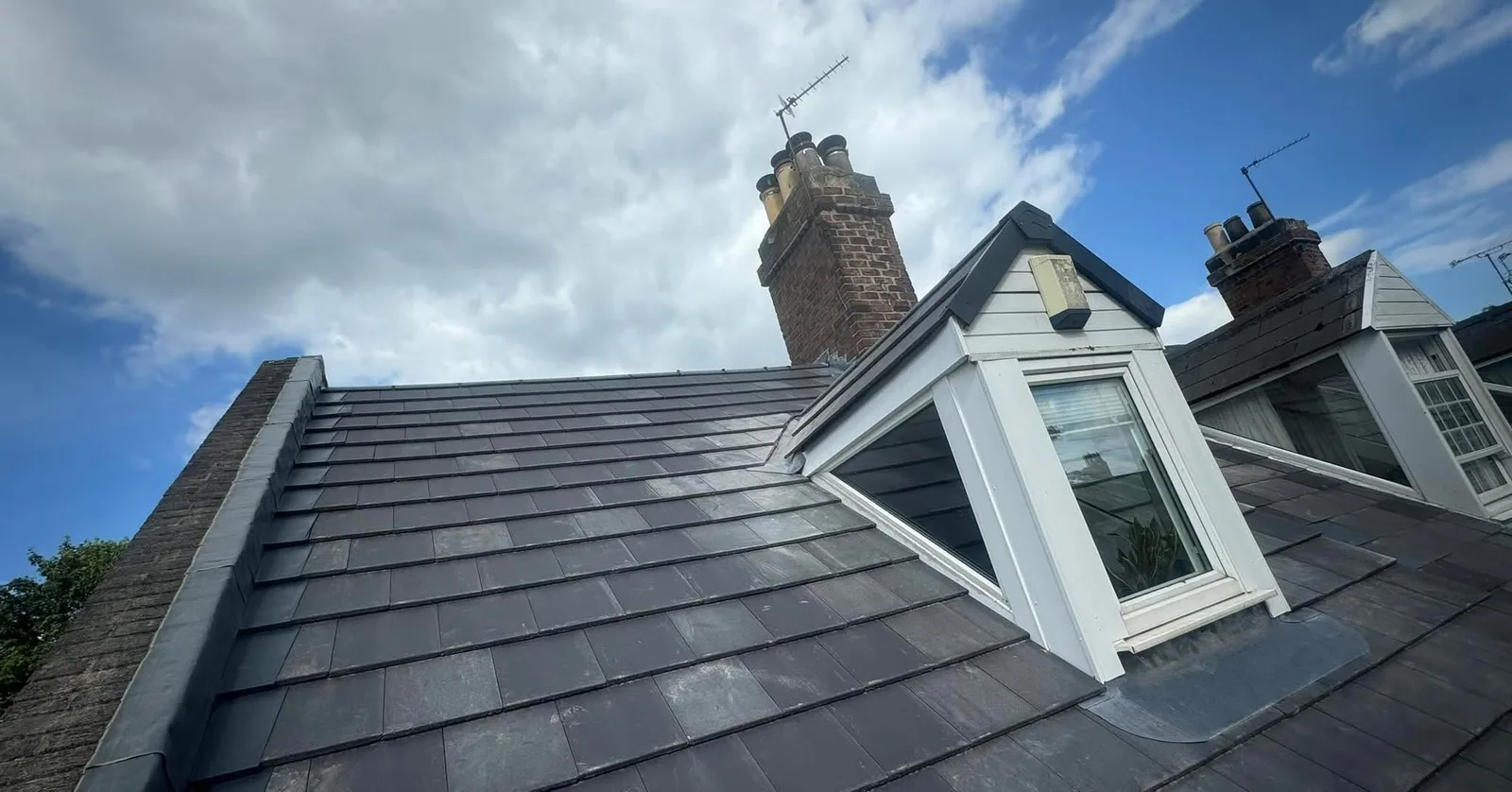 A finished natural slate roof with dormers in Sunderland by Forthcoming Group