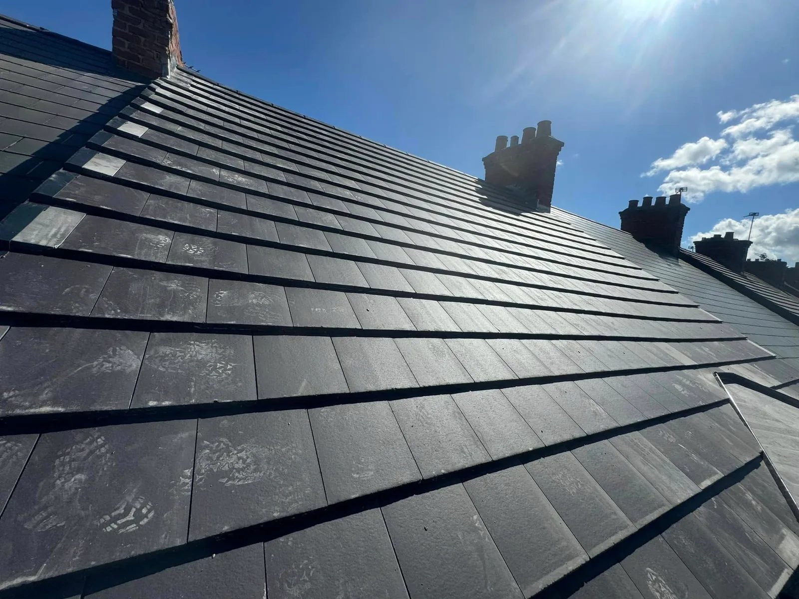 A completed slate roof on a terrace in Sunderland by Forthcoming Group